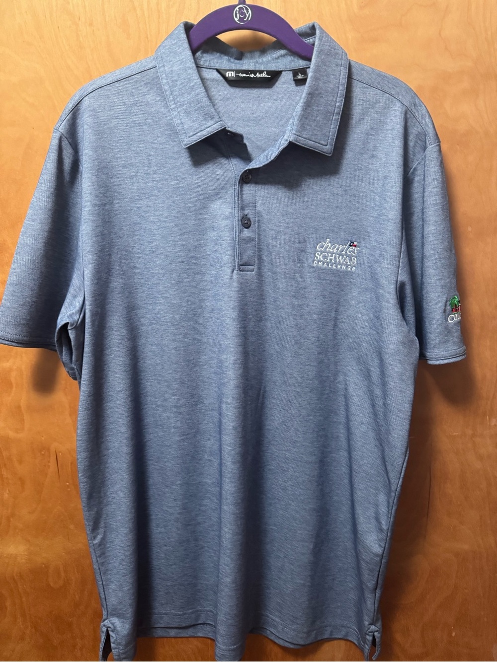 Travis Mathew Men’s Heathered Blue Polo with Embroidered Chest Logo